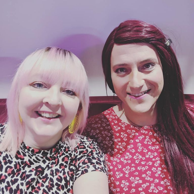 two women smiling