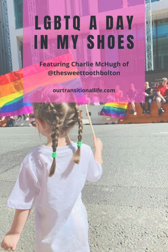 Pin with pride flag and girl at a pride parade