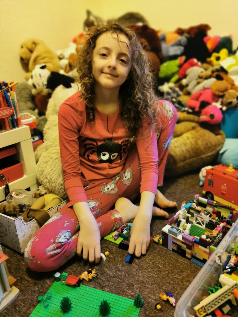 Young girl with Lego